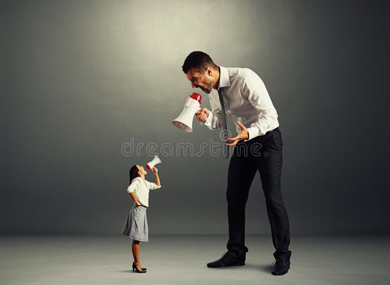 Quarrel between small woman and big man