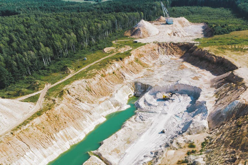 An Old Gypsum Quarry Filled With Blue And Pure Water. Aerial View, From Top To Bottom Stock