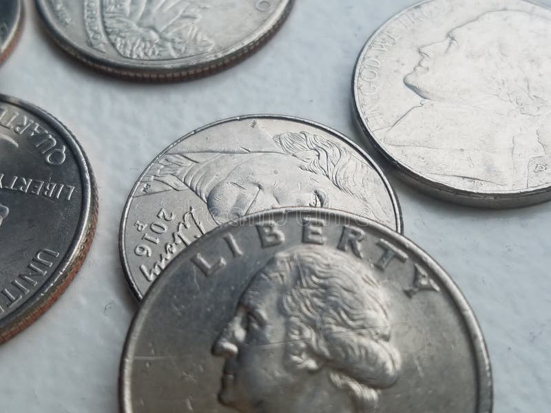 Quart de liberté de devise des USA et d'autres pièces de monnaie de plan rapproché photographie stock Quart de liberté de devise des USA et d'autres pièces de monnaie de plan rapproché photographie stock