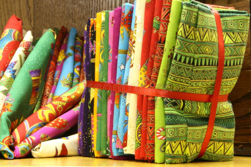 Close up of bold colorful fat quarters quilt material packages available for sale. Close up of bold colorful fat quarters quilt material packages available for sale