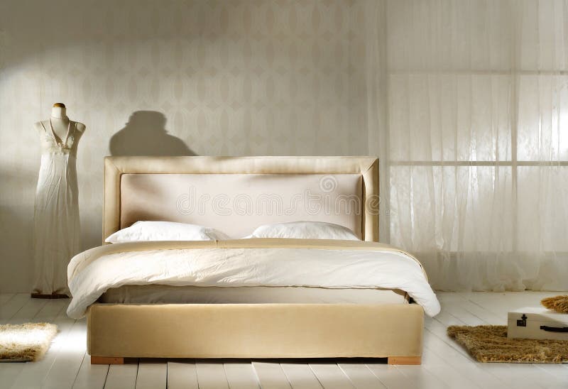 A bedroom with vintage decorations, dominantly white color. A bedroom with vintage decorations, dominantly white color.