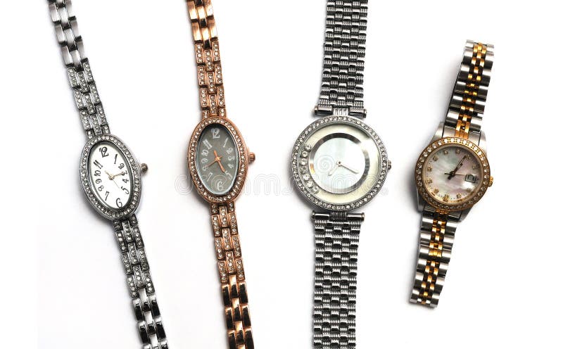 Quatre argent et or ont coloré des montres de dames de différentes forme et tailles images stock Quatre argent et or ont coloré des montres de dames de différentes forme et tailles images stock