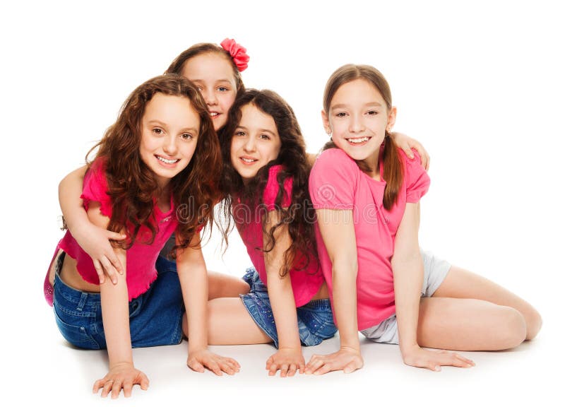 Quatro Meninas Dos Miúdos No Rosa Imagem de Stock - Imagem de quatro