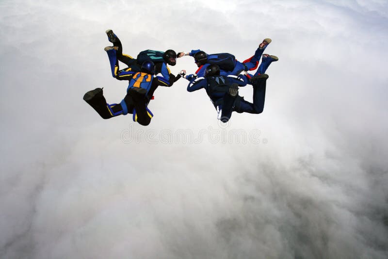 Quattro Skydivers fotografia stock Quattro Skydivers fotografia stock