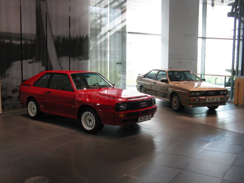 Ingolstadt, Audi museum. A pair of Audi quattro, a grey one original Ur Quattro, and the wildest version, ared Sport Quattro show the different evolutions of the well known coupe that changed the rallies. Ingolstadt, Audi museum. A pair of Audi quattro, a grey one original Ur Quattro, and the wildest version, ared Sport Quattro show the different evolutions of the well known coupe that changed the rallies.