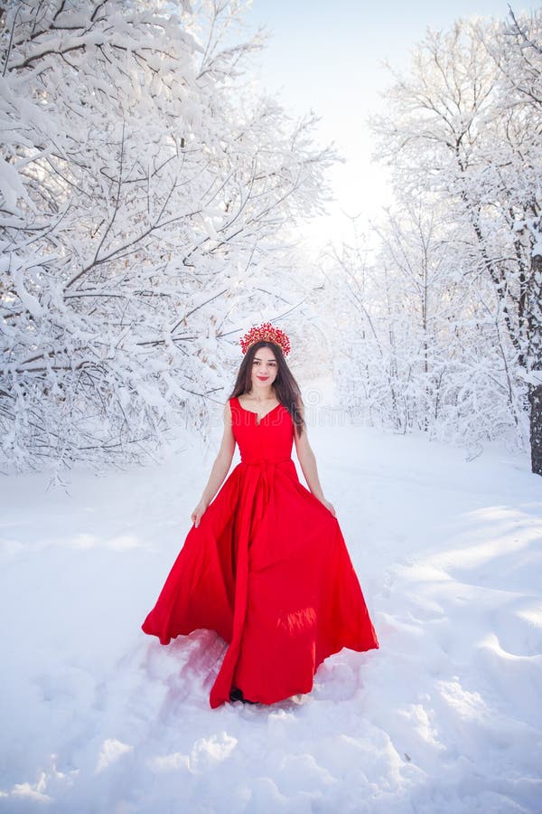 Queen in a Red Crown among the Winter Forest. Lovely Girl in a Stock ...