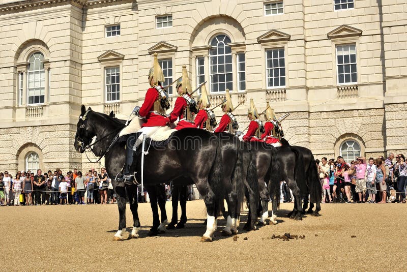 Queen´s guards on horses editorial image. Image of clock 25049165