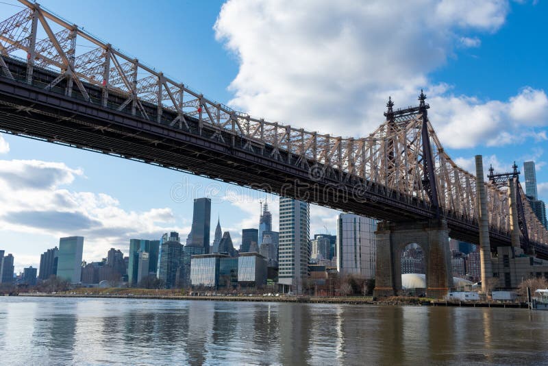 Queensboro Bridge Along the East River with the Midtown Manhattan ...