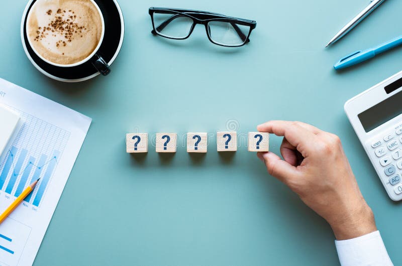 Question and answer concepts with business person and sign on desk table. performance of human royalty free stock images.