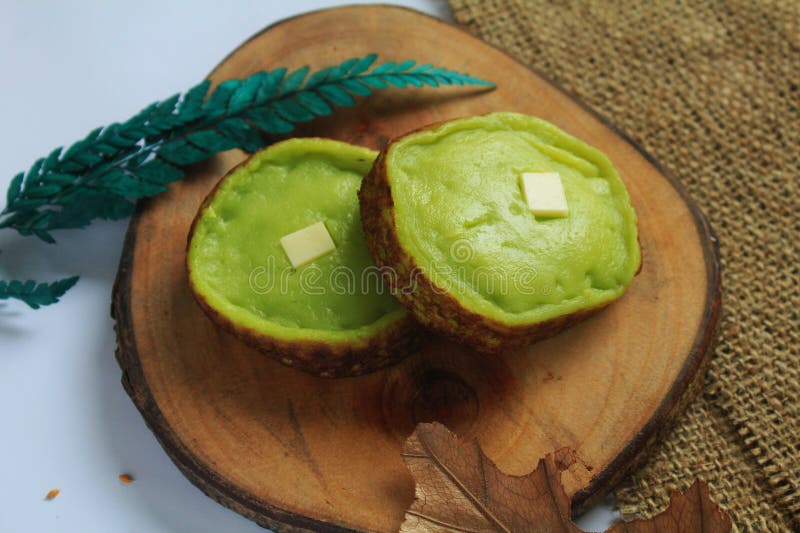 This dessert is called Kue Lumpur or mud cake in the middle of which there is a piece of cheese in Semarang, Indonesia on March 27, 2021. This dessert is called Kue Lumpur or mud cake in the middle of which there is a piece of cheese in Semarang, Indonesia on March 27, 2021.