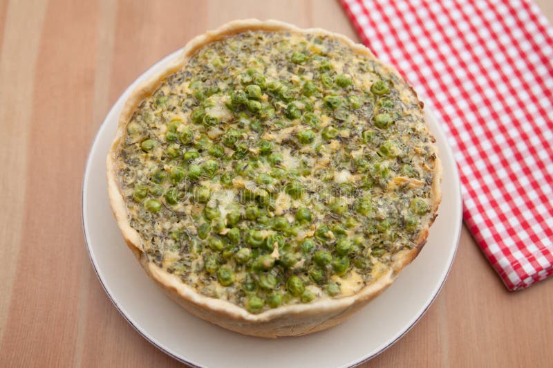 Quiche Lorraine with peas stock photo. Image of bacon 37781708