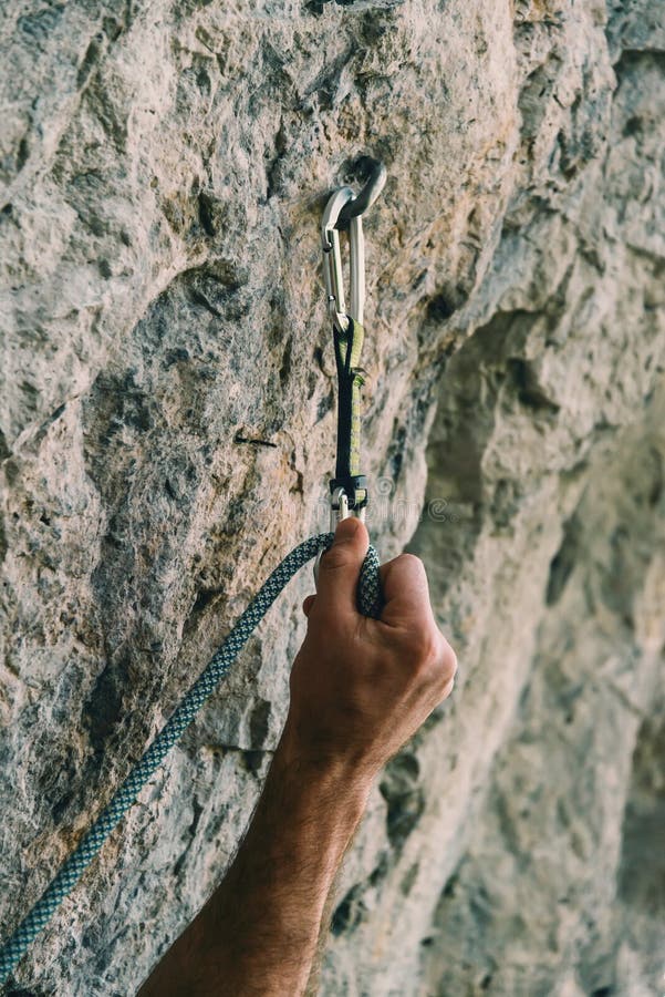 Quick-draw on rock wall stock image. Image of safety - 74953597