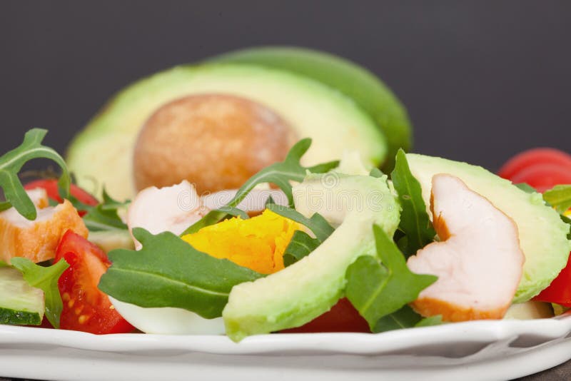 Quick and healthy Vegetable salad with Avocado, Eggs,Tomatoes and rucola..