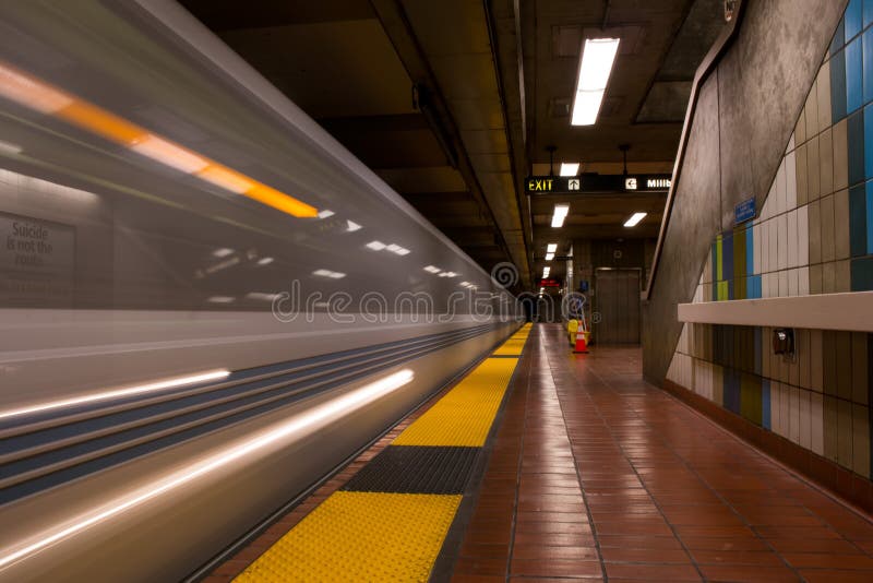 Quick passing subway train cart