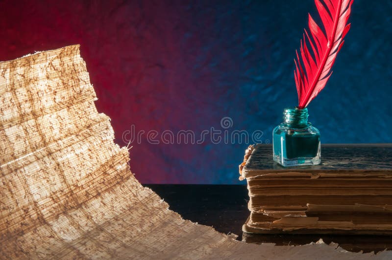 Quill pen and papyrus sheet royalty free stock photos