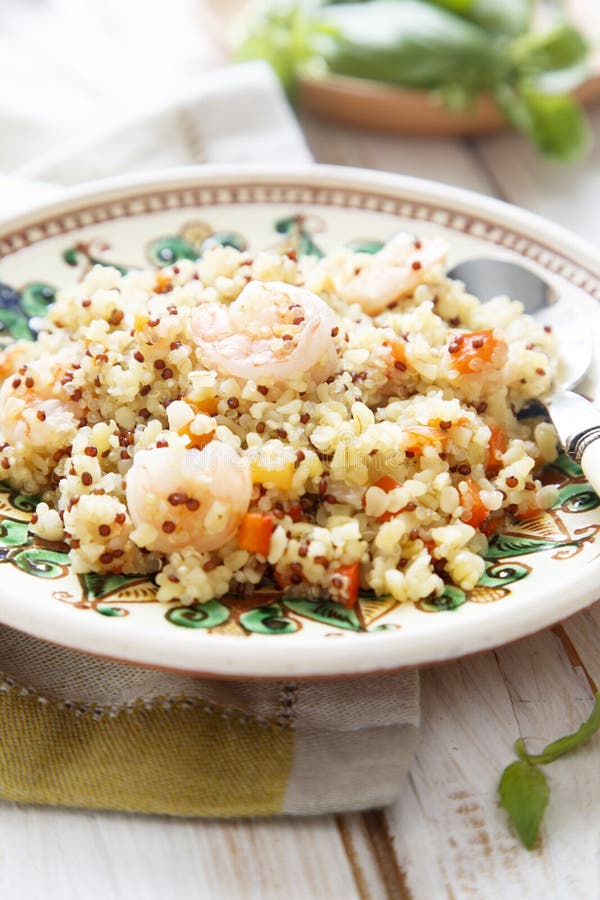 Quinoa and bulgur pilaf stock photo. Image of blue, tomato 29624984