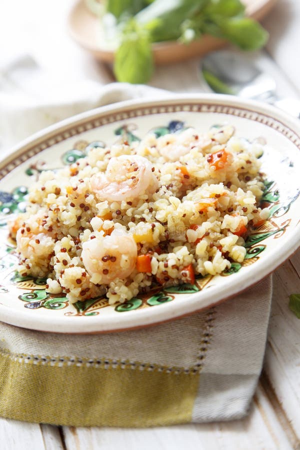 Quinoa and bulgur pilaf stock photo. Image of blue, tomato 29624984