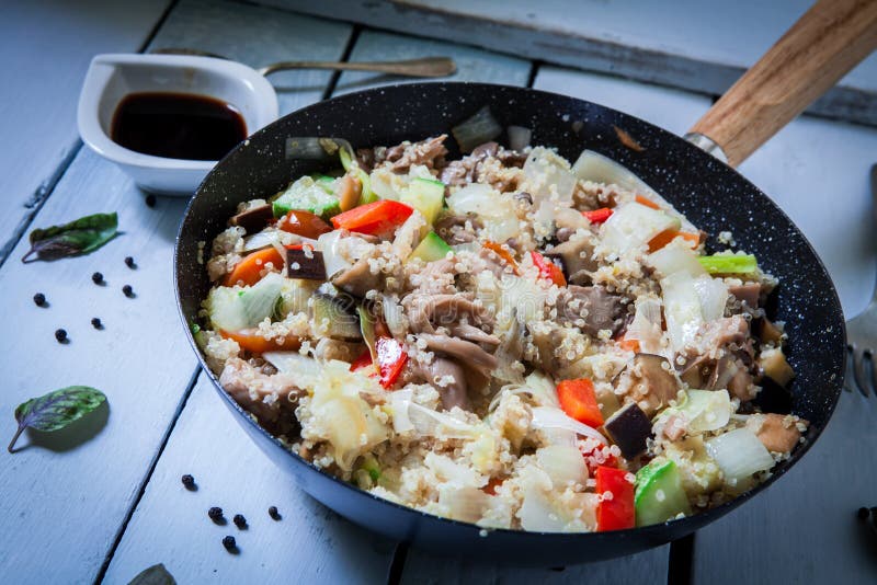 Quinoa with vegetables stock photo. Image of dish, basil 136496324