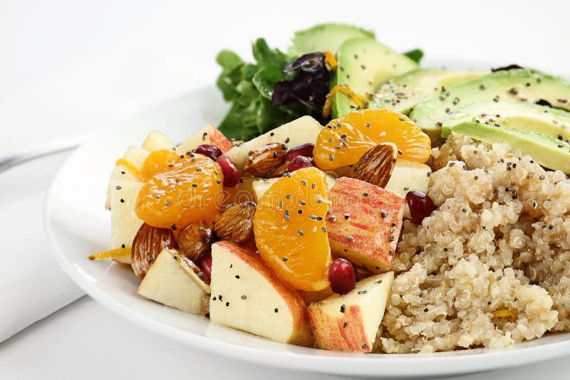 Quinoa, avocado and apple salad. Perfect for the detox diet or just a healthy meal. Selective focus with extreme shallow depth of field. Quinoa, avocado and apple salad. Perfect for the detox diet or just a healthy meal. Selective focus with extreme shallow depth of field.
