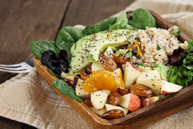 Quinoa, avocado and apple salad. Perfect for the detox diet or just a healthy meal. Selective focus with extreme shallow depth of field. Quinoa, avocado and apple salad. Perfect for the detox diet or just a healthy meal. Selective focus with extreme shallow depth of field.