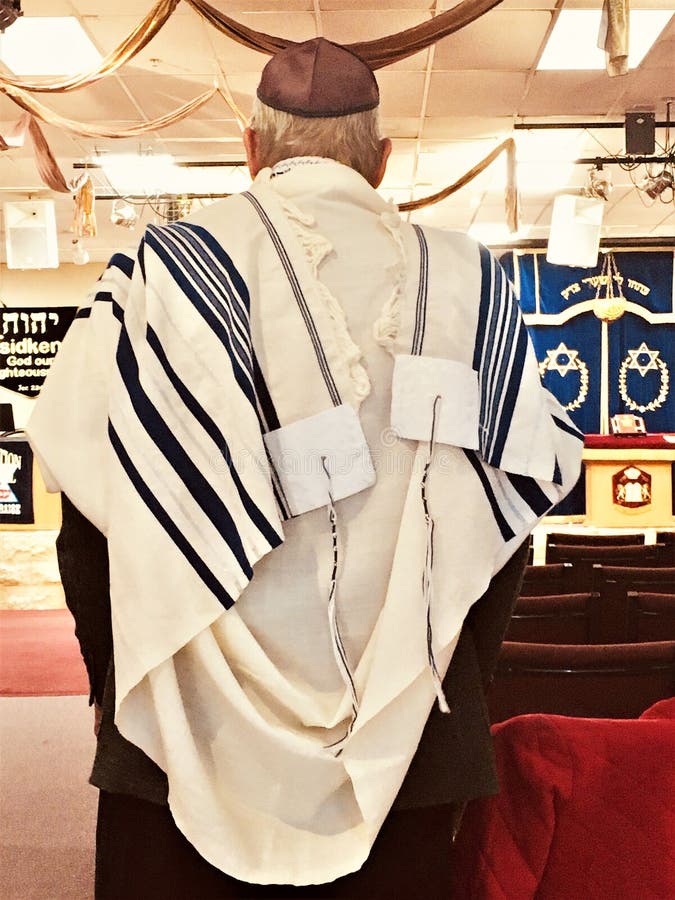 Rabbi Wearing a Tallit or Prayer Shawl during a Service. Editorial
