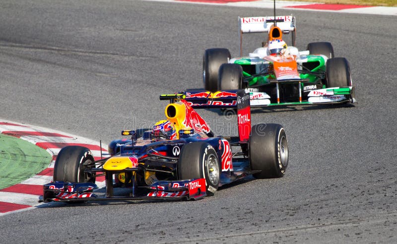 BARCELONA - FEBRUARY 24: Mark Webber of Red Bull F1 team racing at Formula One Teams Test Days at Catalunya circuit on February 24, 2012 in Barcelona, Spain. BARCELONA - FEBRUARY 24: Mark Webber of Red Bull F1 team racing at Formula One Teams Test Days at Catalunya circuit on February 24, 2012 in Barcelona, Spain.