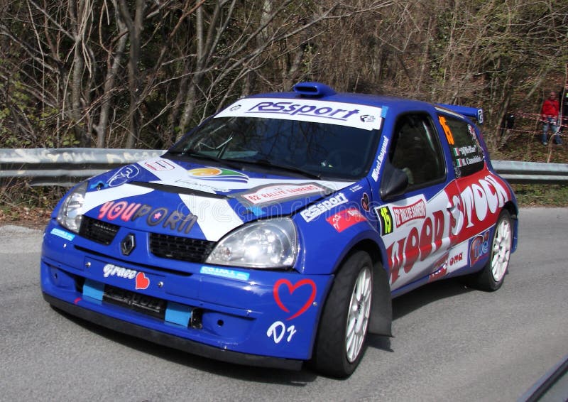 Racing car Renault Clio super 1600 in the foreground