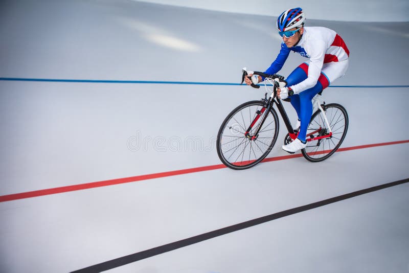 Racing cyclist on velodrome outdoor. royalty free stock photos Racing cyclist on velodrome outdoor. royalty free stock photos