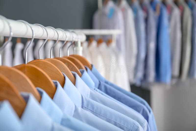 Dry Cleaned Shirts On Hangers On A Rack Stock Photo - Download Image Now - Dry  Cleaned, Dry Cleaner, Coathanger - iStock