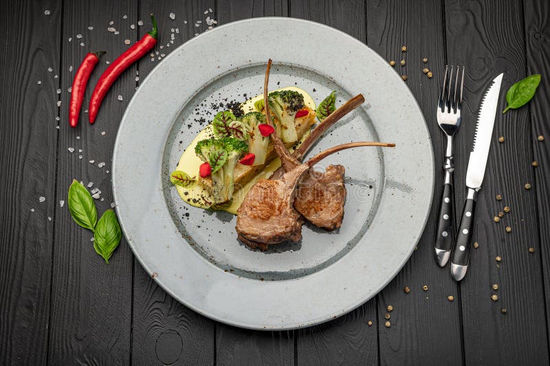 Rack of Lamb with Potato Gratin and Grilled Broccoli Stock Image ...