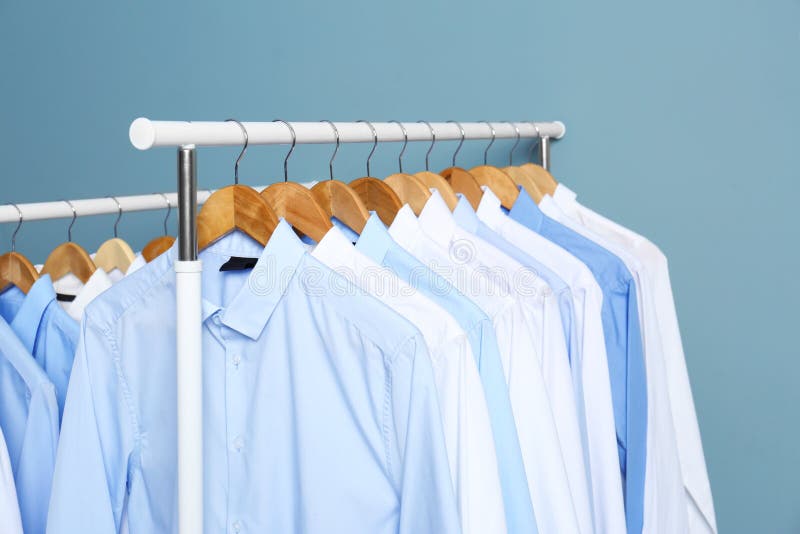 Racks with Clean Clothes after Dry-cleaning Stock Photo - Image of male,  cloth: 114942906