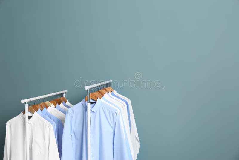 Racks with Clean Clothes after Dry-cleaning Stock Photo - Image of  background, clean: 115680490