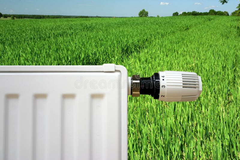 Radiateur sur une zone verte images libres de droits Radiateur sur une zone verte images libres de droits