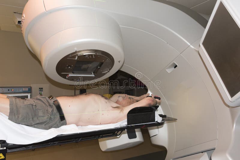 Patient Radiation therapy showing laser lines for targeting cancer cells in the brain and Throat. Patient Radiation therapy showing laser lines for targeting cancer cells in the brain and Throat