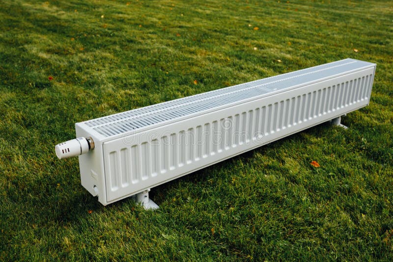 Radiator on Green Lawn, Ecological Heating Concept Stock Image Image