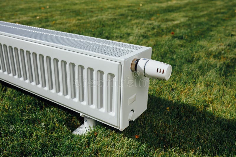 Radiator On Green Lawn, Ecological Heating Concept Stock Image Image