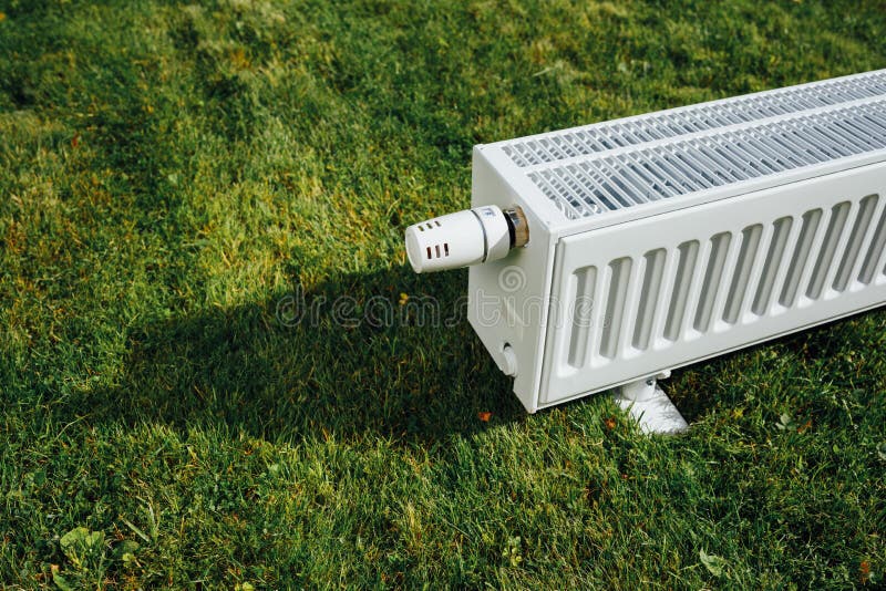 Radiator on Green Lawn, Ecological Heating Concept Stock Image Image