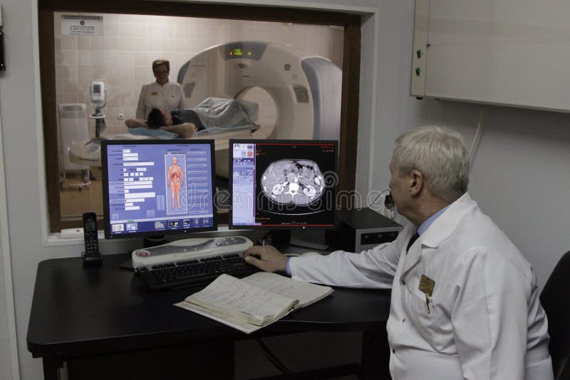 Doctor doing magnetic resonance imaging of the lungs of a patient. Doctor doing magnetic resonance imaging of the lungs of a patient