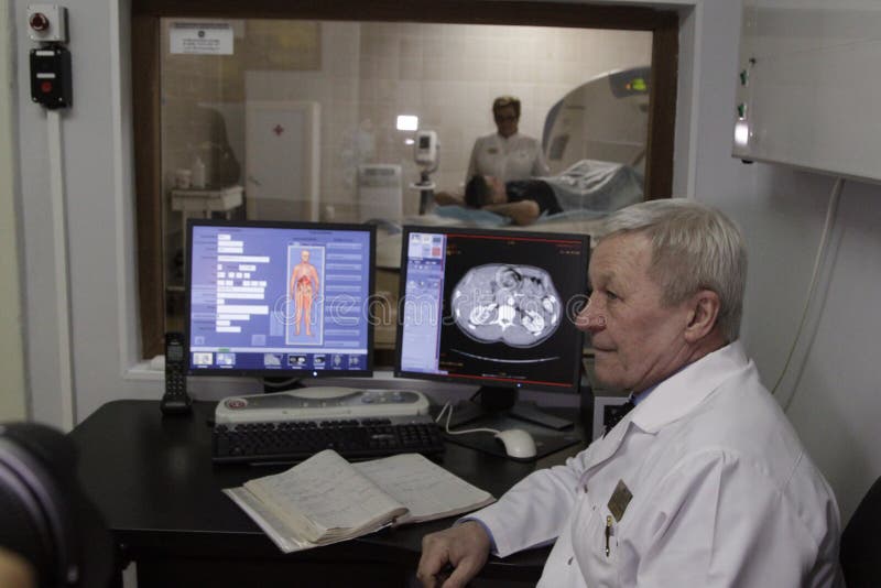 Doctor doing magnetic resonance imaging of the lungs of a patient. Doctor doing magnetic resonance imaging of the lungs of a patient