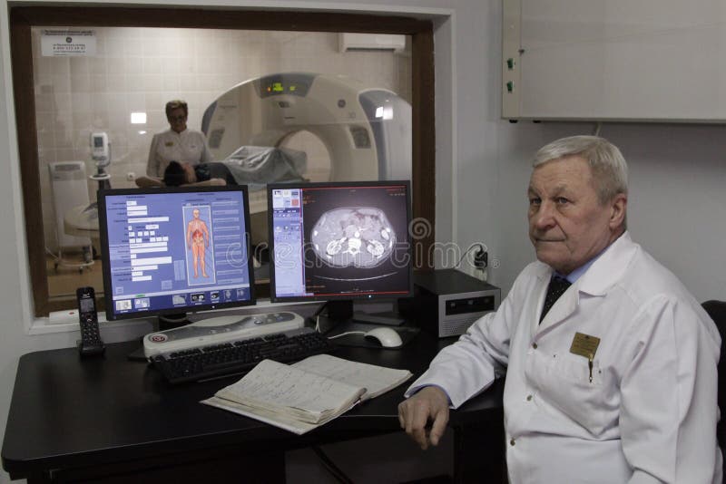 Doctor doing magnetic resonance imaging of the lungs of a patient. Doctor doing magnetic resonance imaging of the lungs of a patient