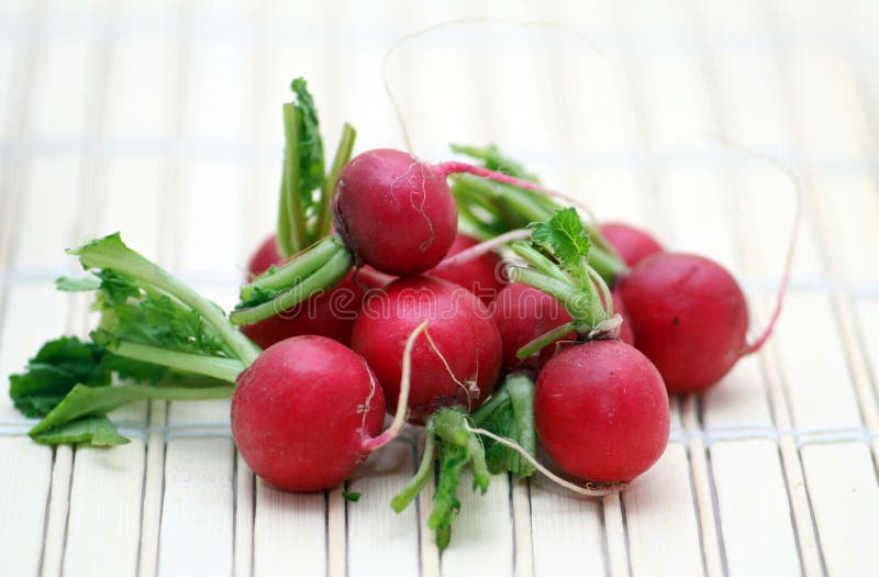 Radishes on table mat