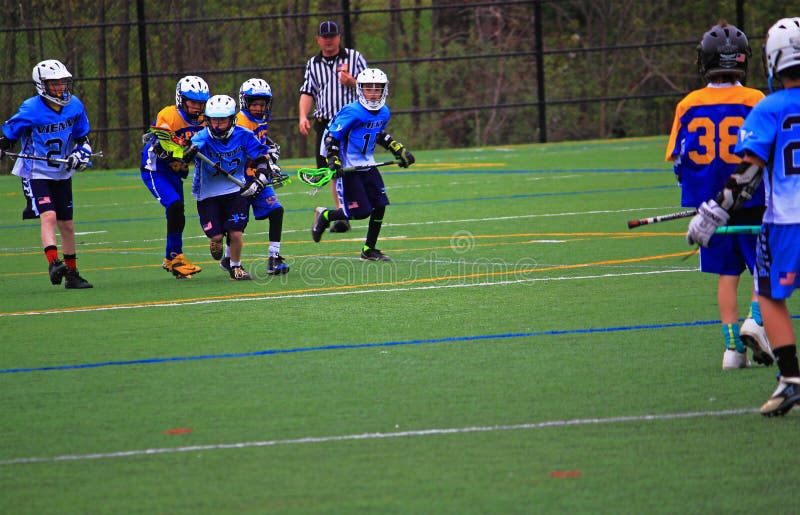 Raduni di lacrosse del ragazzo fotografie stock libere da diritti Raduni di lacrosse del ragazzo fotografie stock libere da diritti