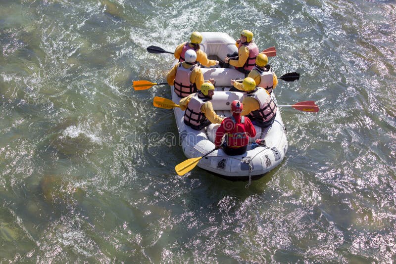 Rafting boat colors people rowing in Arahthos river Arta Greece