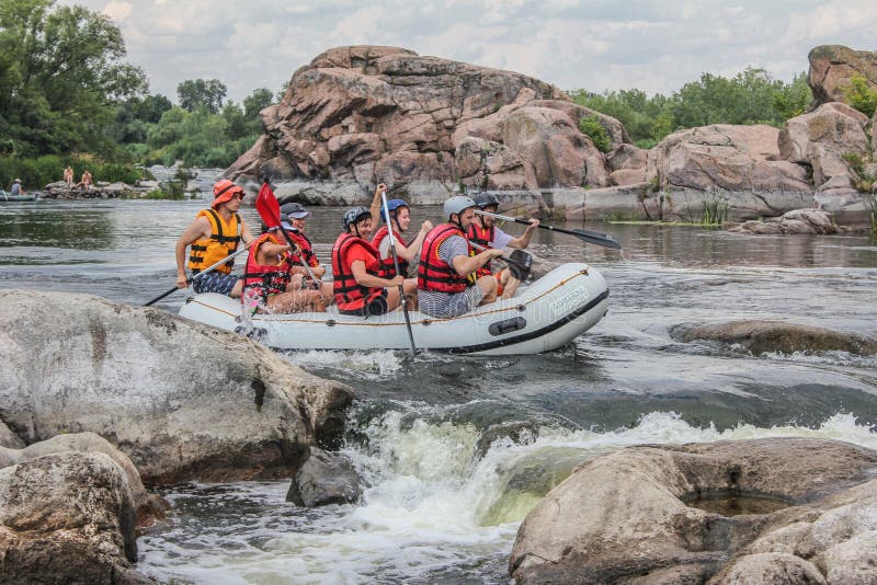 Rafting team , summer extreme water sport. Group of people in a rafting boat, beautiful royalty free stock photo Rafting team , summer extreme water sport. Group of people in a rafting boat, beautiful royalty free stock photo