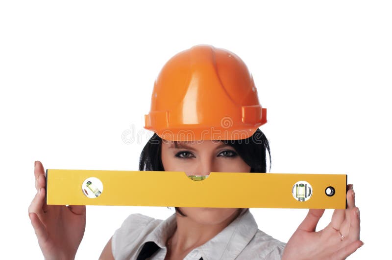 Ragazza affascinante il costruttore fotografia stock libera da diritti Ragazza affascinante il costruttore fotografia stock libera da diritti