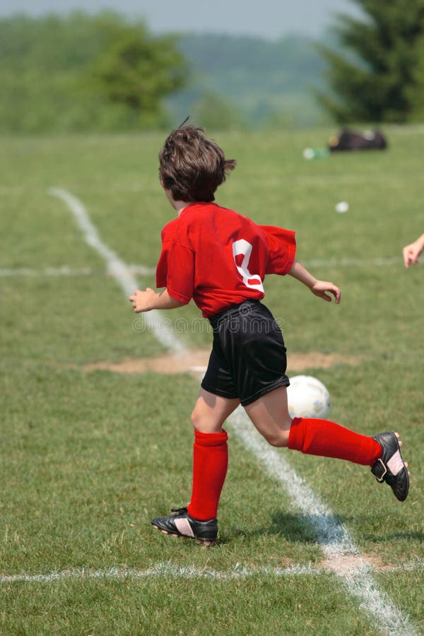 Ragazza al Campo da Calcio 26 fotografia stock libera da diritti