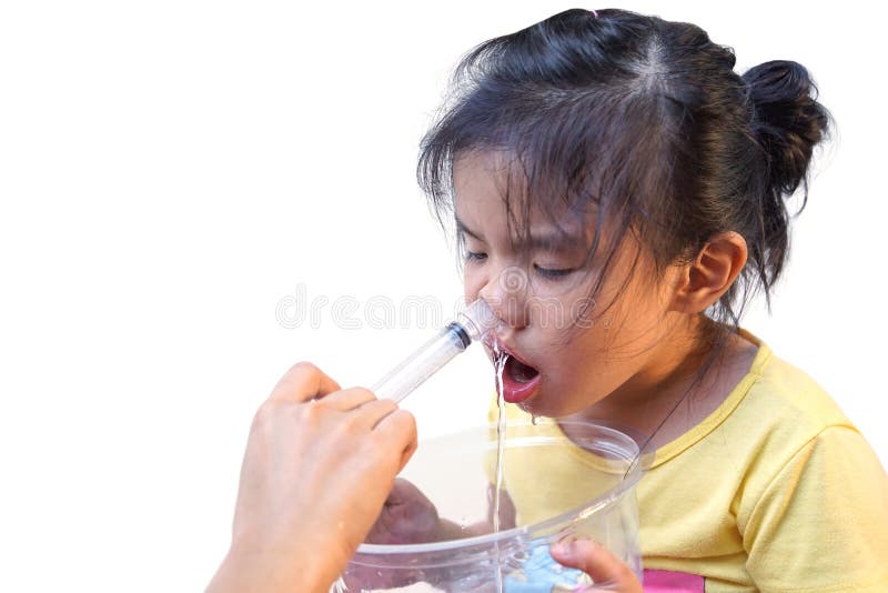 Asian girl using nasal irrigation isolated on white background with copy space to add text. Asian girl using nasal irrigation isolated on white background with copy space to add text