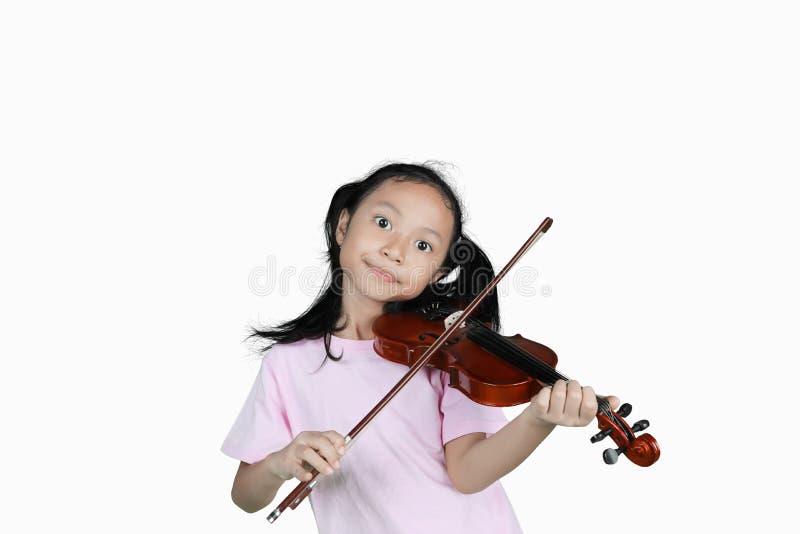 Ragazza che gioca violino nello studio fotografie stock Ragazza che gioca violino nello studio fotografie stock