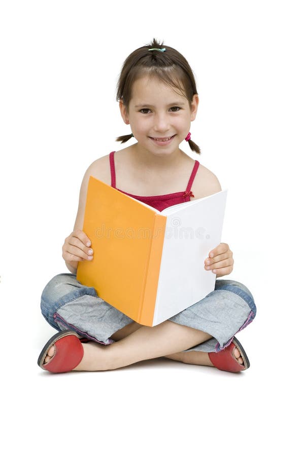 Young girl reading a book isolated on white. Young girl reading a book isolated on white