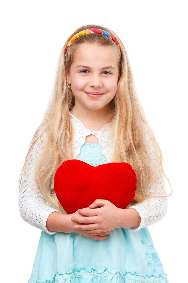 Ragazza con un cuore rosso fotografia stock libera da diritti Ragazza con un cuore rosso fotografia stock libera da diritti